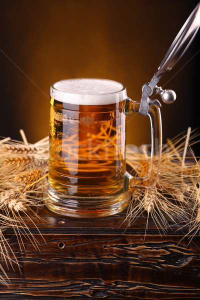 Mug of beer on a chest Stock photo © hiddenhallow