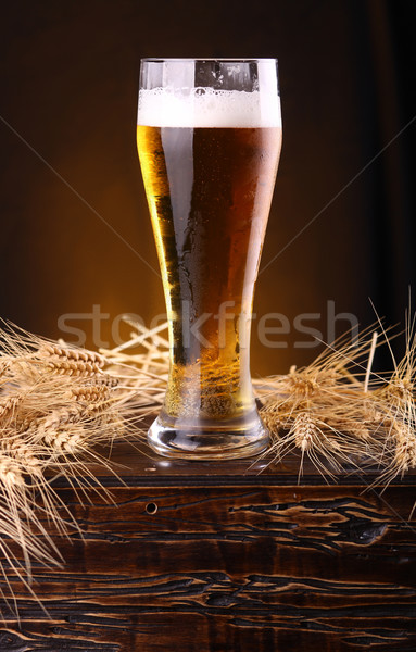 Glass of beer on a chest Stock photo © hiddenhallow
