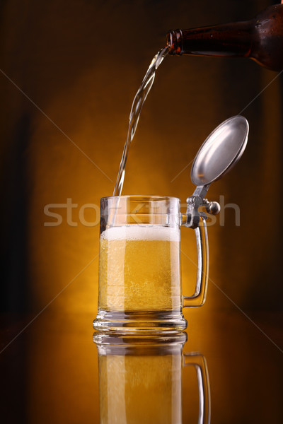 Pouring beer Stock photo © hiddenhallow