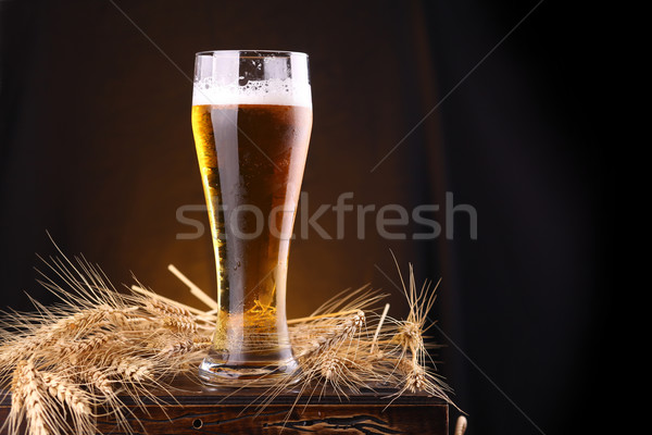 Glass of beer on a chest Stock photo © hiddenhallow