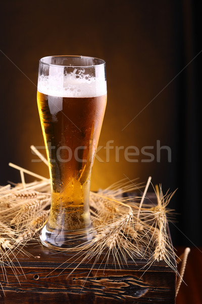 Glass of beer on a chest Stock photo © hiddenhallow