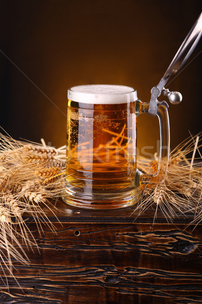 Mug of beer on a chest Stock photo © hiddenhallow