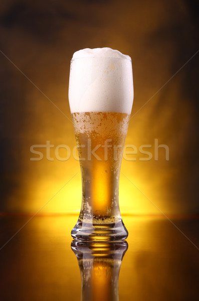 Vidrio cerveza alto ricos espuma Foto stock © hiddenhallow