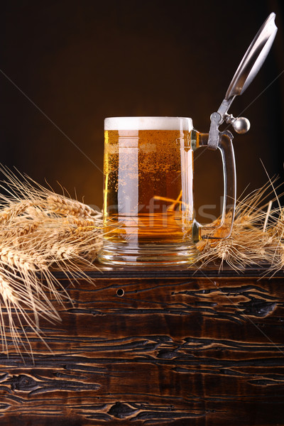 Mug of beer on a chest Stock photo © hiddenhallow