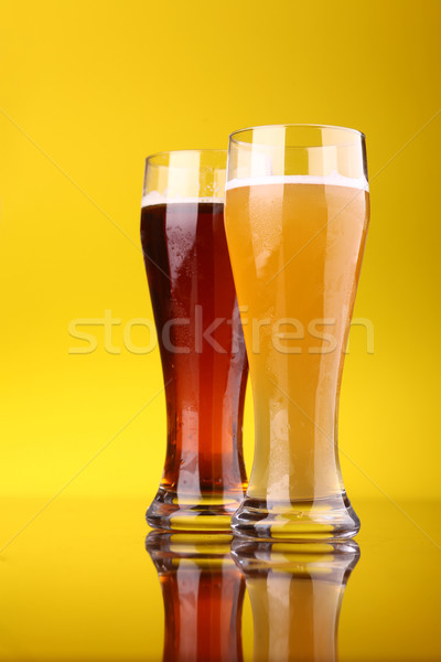 Vidrio cerveza dos gafas brillante amarillo Foto stock © hiddenhallow