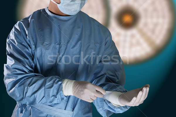 Stock photo: Doctor  prepare surgery equipment