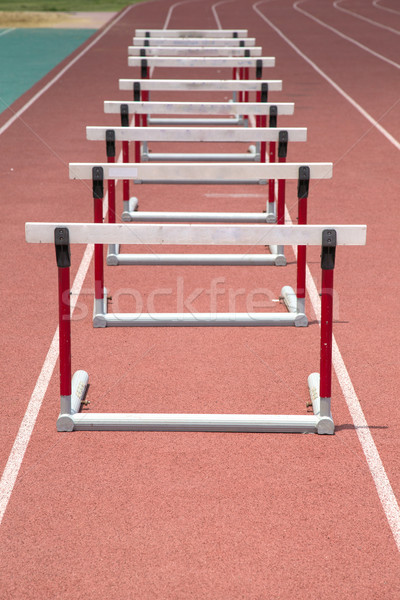 hurdles on the red running track prepared  Stock photo © hin255