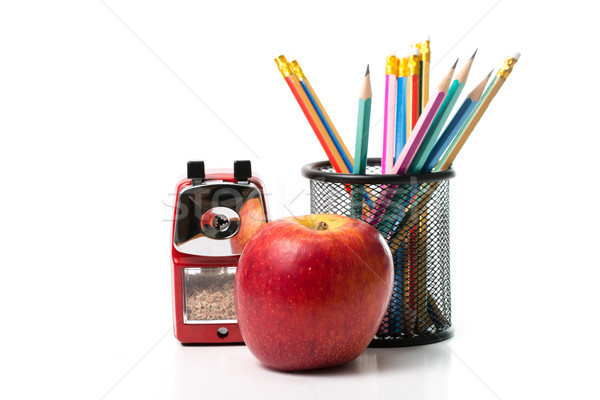 Apple,pencils and Red color metal pencil sharpener  Stock photo © hin255