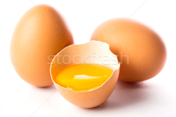 Broken egg isolated placed  Stock photo © hin255