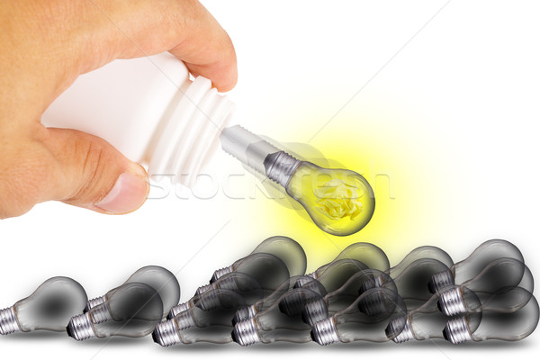 Stock photo: Hand drop idea bulb 