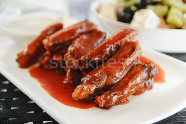Pollo ali rosso salsa formaggio tipo gorgonzola bar Foto d'archivio © hitdelight