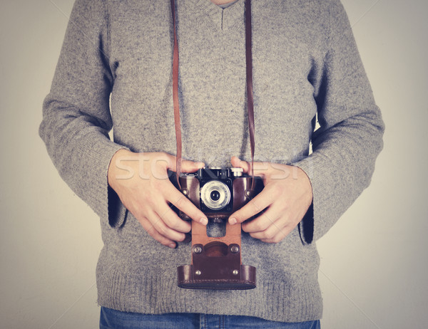 Man holiding retro camera Stock photo © hitdelight