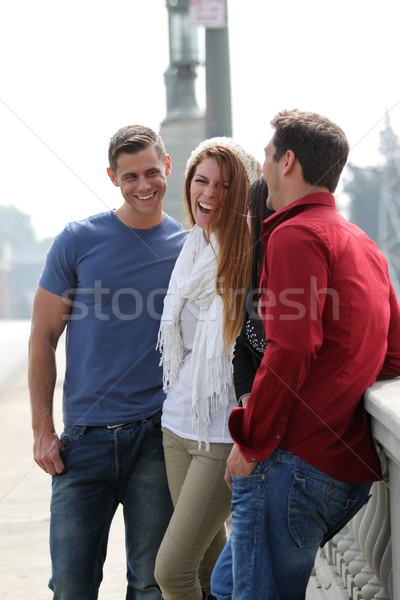 Amigos falante quatro em pé juntos mulheres Foto stock © hlehnerer