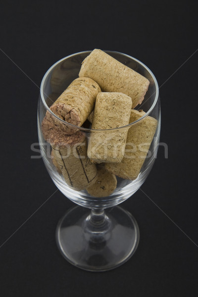 Stock photo: wineglass filled with corks