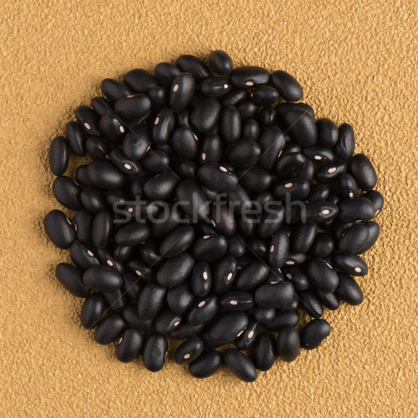 Circle of black beans Stock photo © homydesign