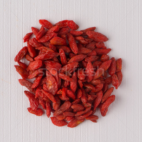 Circle of dry red goji berries Stock photo © homydesign