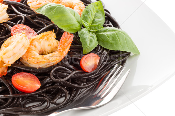 Stock photo: Black spaghetti with shrimps