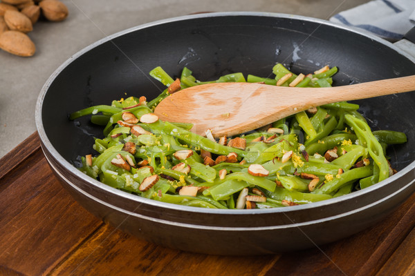 Zöldbab pörkölt mandulák serpenyő konyha egészség Stock fotó © homydesign
