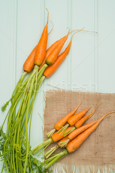 Carrots on a wooden table Stock photo © homydesign