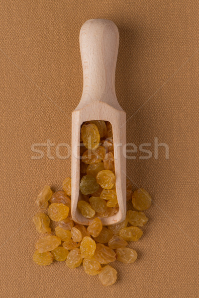 Holz schöpfen golden Rosinen top Ansicht Stock foto © homydesign