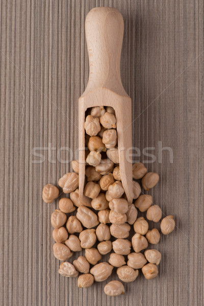 Wooden scoop with chickpeas Stock photo © homydesign