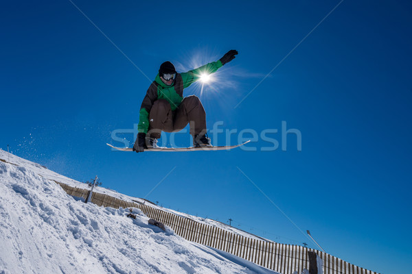 Snowbordos ugrik kék ég ugrás sport hó Stock fotó © homydesign