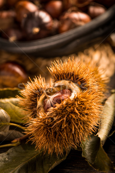 Roasted chestnuts and leaves Stock photo © homydesign