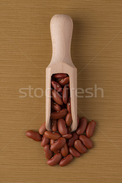 Wooden scoop with red beans Stock photo © homydesign