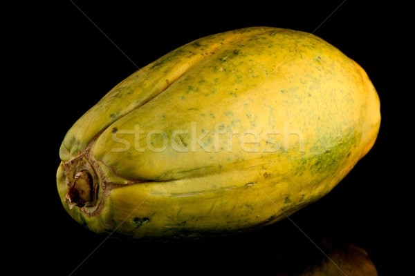 Papaya fruit on black background Stock photo © homydesign