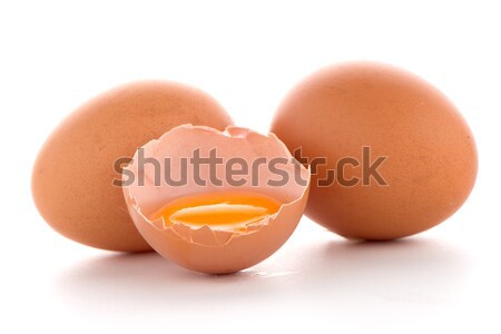 Raw eggs isolated on white Stock photo © homydesign