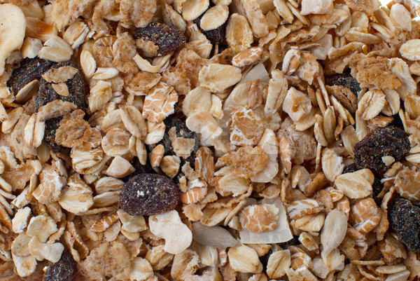 Bran and raisin cereals background Stock photo © homydesign