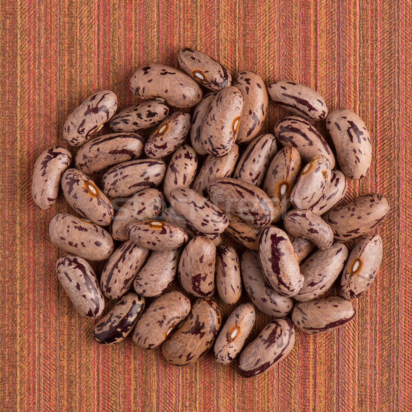 Circle of pinto beans Stock photo © homydesign