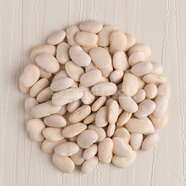 Circle of white beans Stock photo © homydesign
