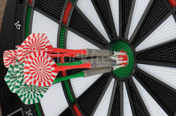 Dart board with darts Stock photo © homydesign