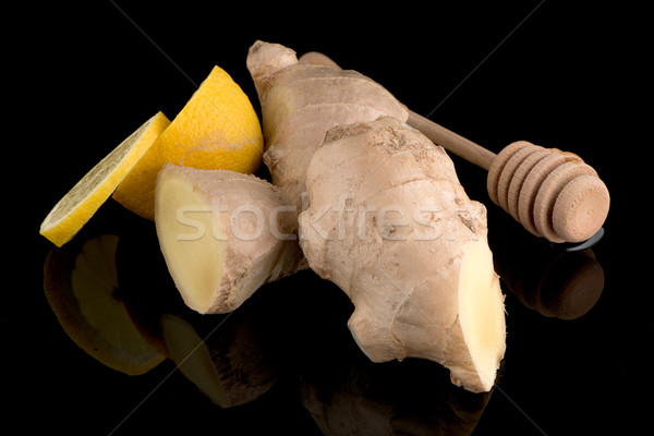 Ginger root on black Stock photo © homydesign