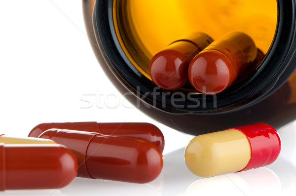 Pills from bottle Stock photo © homydesign