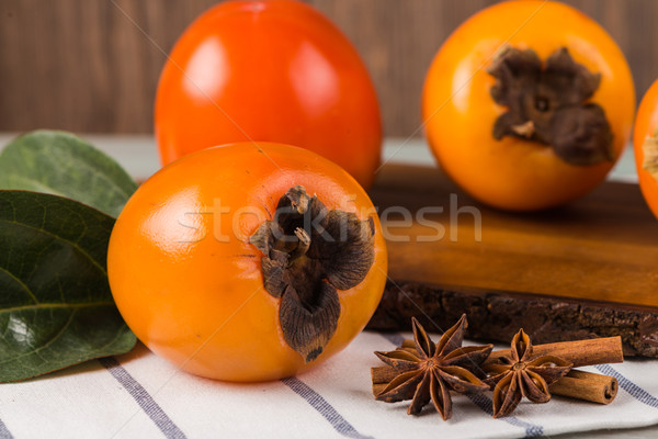 Orange persimmons Stock photo © homydesign