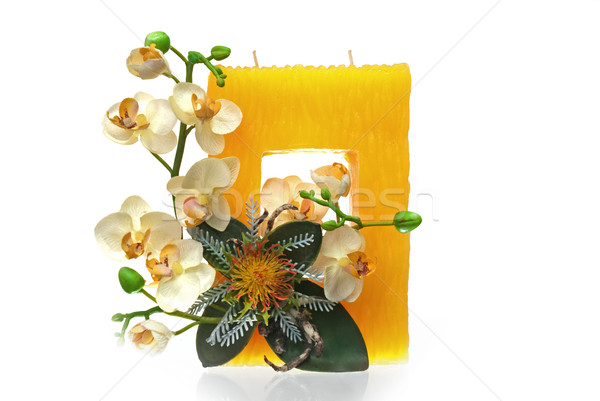 Large yellow candle with the flower decoration Stock photo © homydesign
