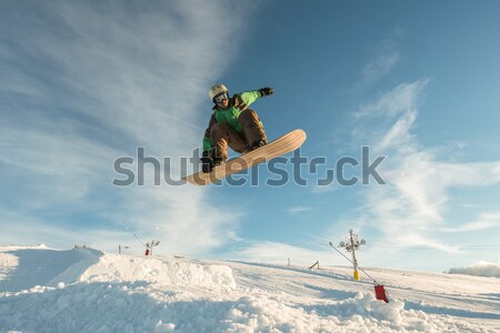 Snowboard montagnes jeune homme homme sport coucher du soleil [[stock_photo]] © homydesign