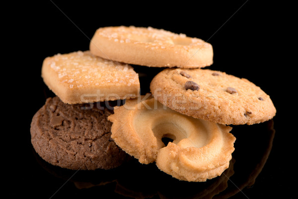 Butter cookies on black Stock photo © homydesign