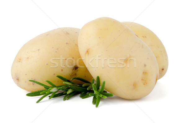 New potatoes and green herbs Stock photo © homydesign