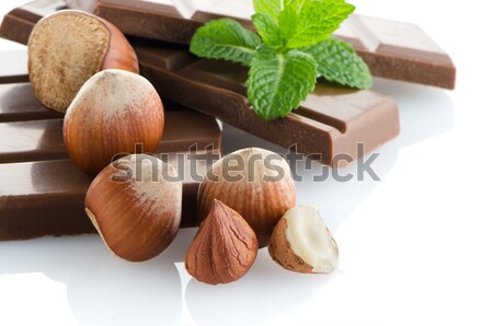 Csokoládé szelet mogyoró friss menta fehér levél Stock fotó © homydesign