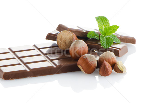 Csokoládé szelet mogyoró friss menta fehér levél Stock fotó © homydesign