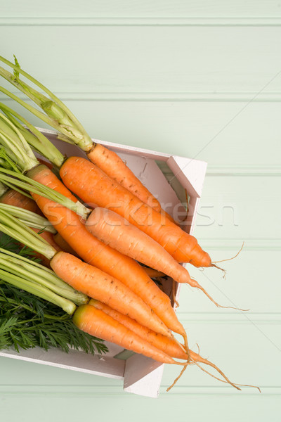 Carottes table en bois à l'intérieur blanche bois boîte [[stock_photo]] © homydesign