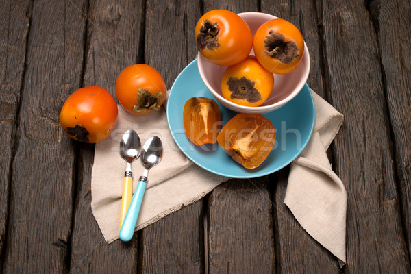Orange persimmons Stock photo © homydesign