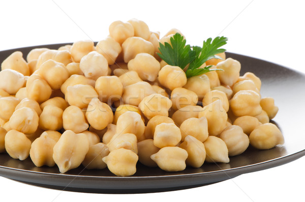 Chickpeas in a brown plate Stock photo © homydesign