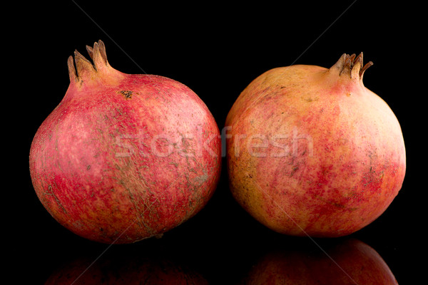 Voll Granatapfel Obst Blätter schwarz Essen Stock foto © homydesign