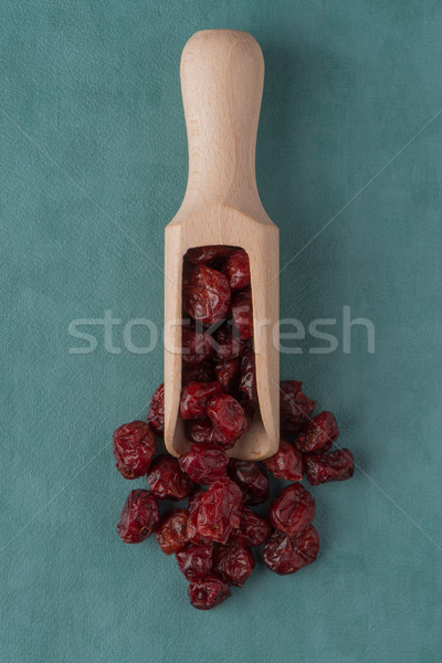 Stock photo: Wooden scoop with dried cranberries