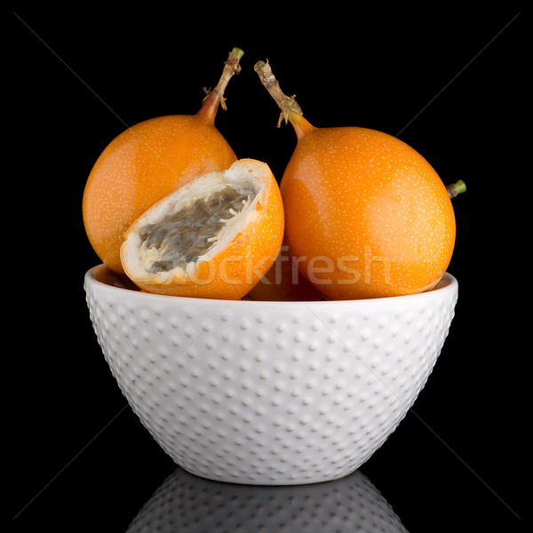 Pasión frutas cerámica blanco tazón negro Foto stock © homydesign