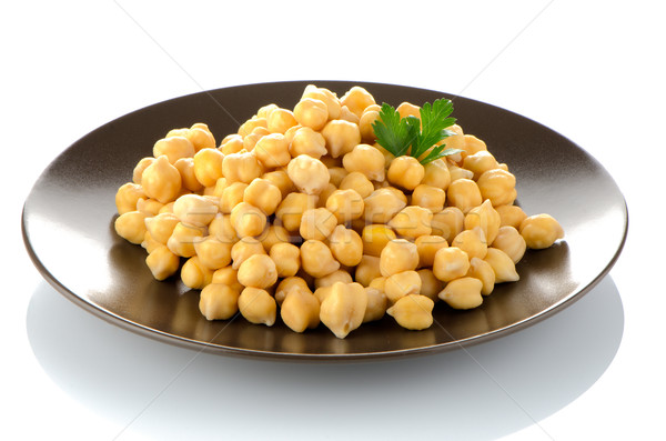 Chickpeas in a brown plate Stock photo © homydesign